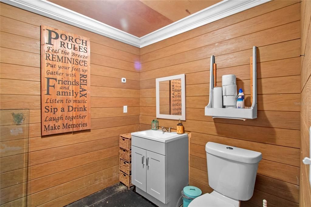 Half bath in garage, pre-plumbed for shower.