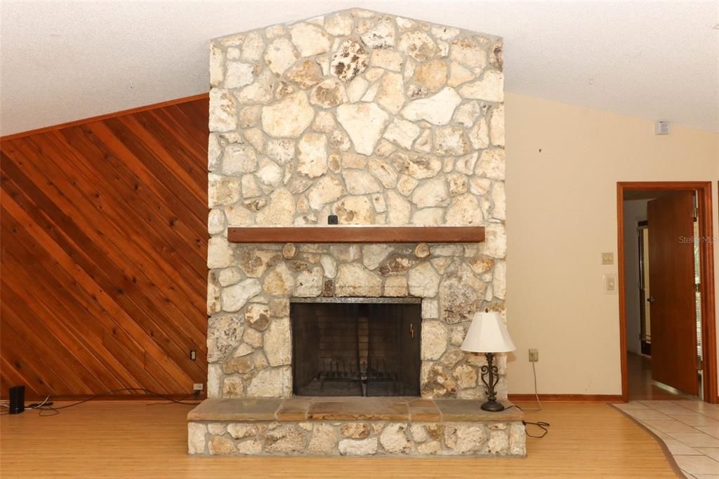 Wood burning fireplace is at the center of it all!