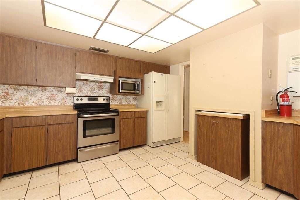 Natural light in kitchen with Skylights above lighting.