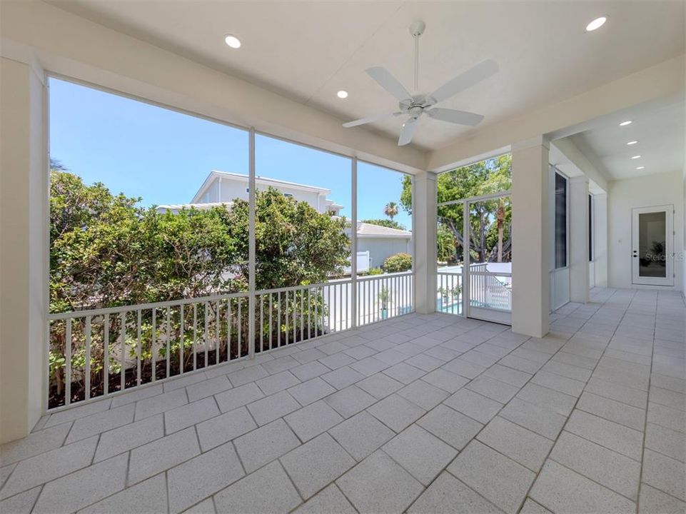 Stairway leads to pool/spa area