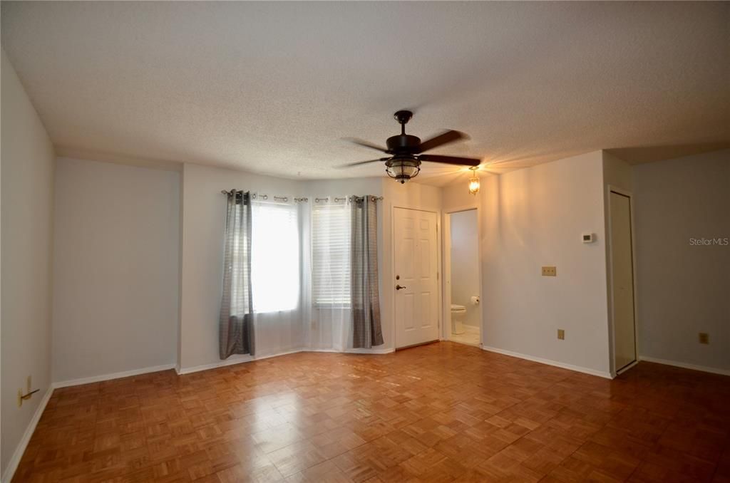 Living room. Downstairs half-bath in corner.