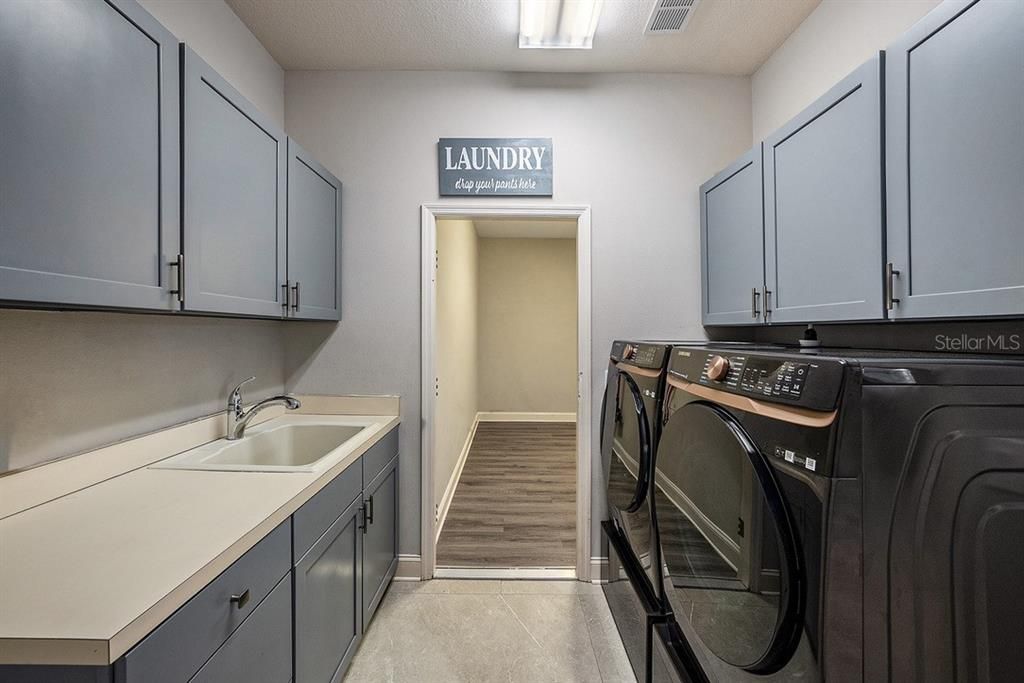 Laundry room with large Storage room and Garage Entry