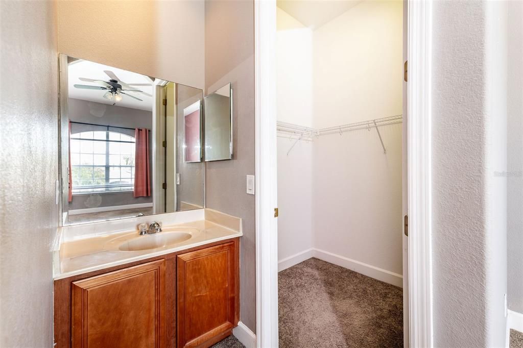 Bedroom 2 with private vanity and walk in closet