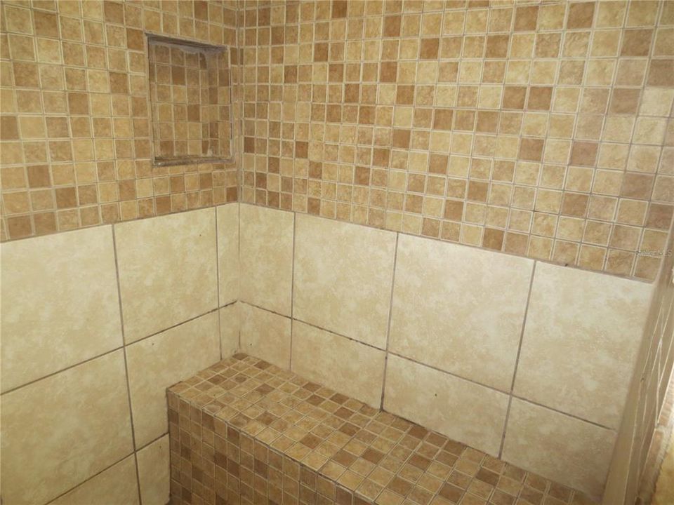 Sit down tiled shower