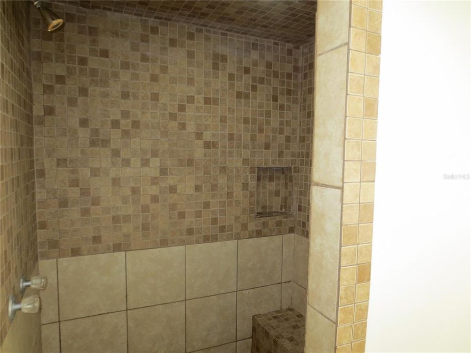 Sit down tiled shower