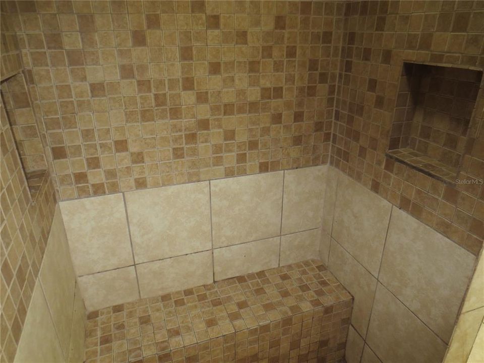 Sit down tiled shower