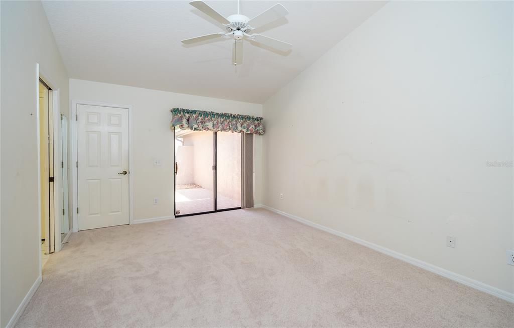 Master Bedroom with sliders to the courtyard