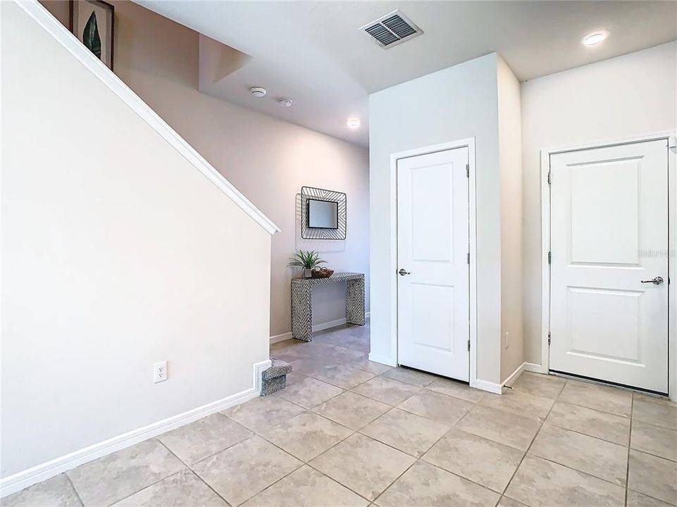 Pantry and door leading to garage