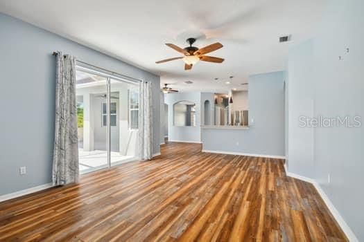 Family Room off Kitchen with Sliding Doors to Lanai and Pool