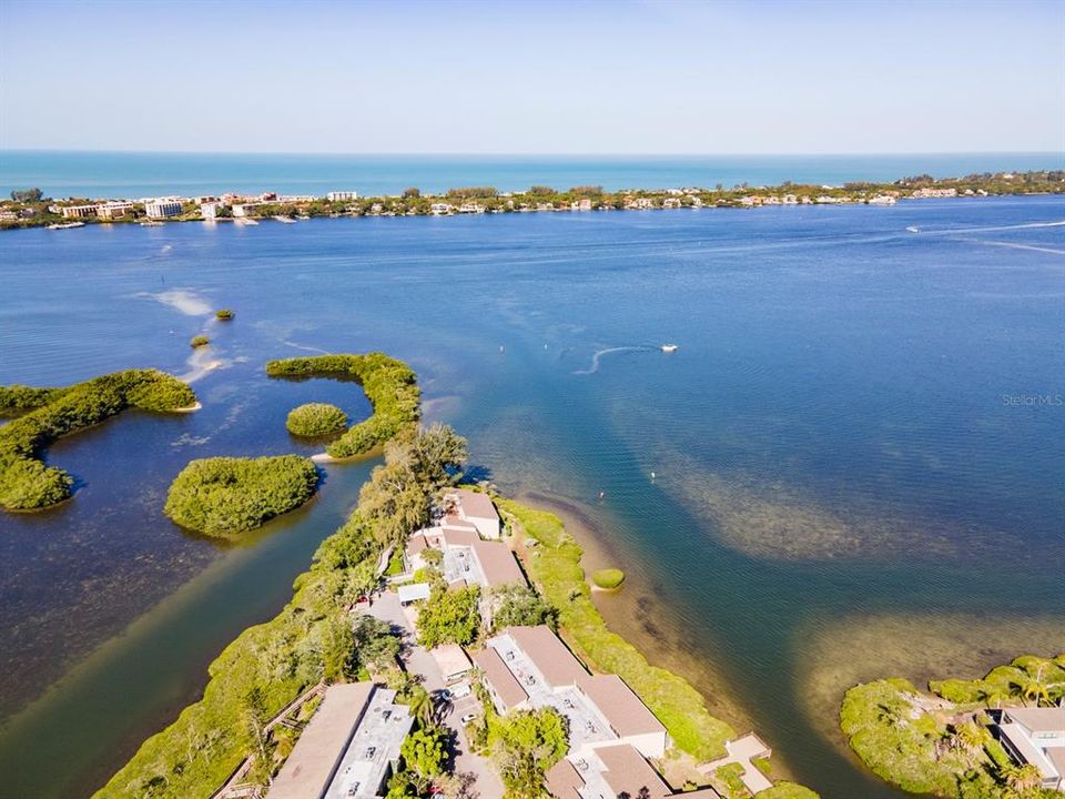 Condo has three sided water views