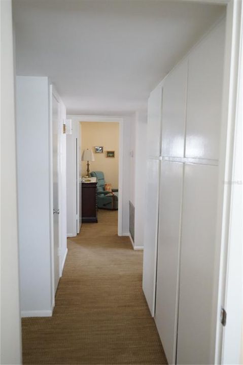 hallway between bedrooms has lots of storage