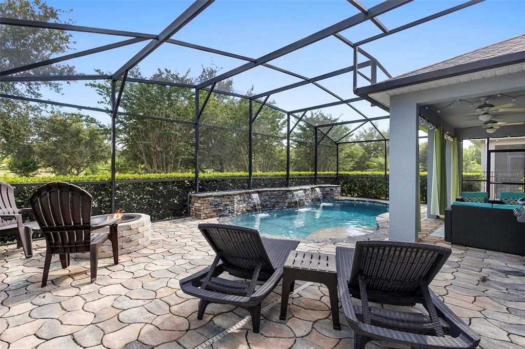 Pool area with fire pit.