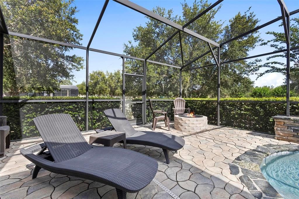 Pool area with fire pit.