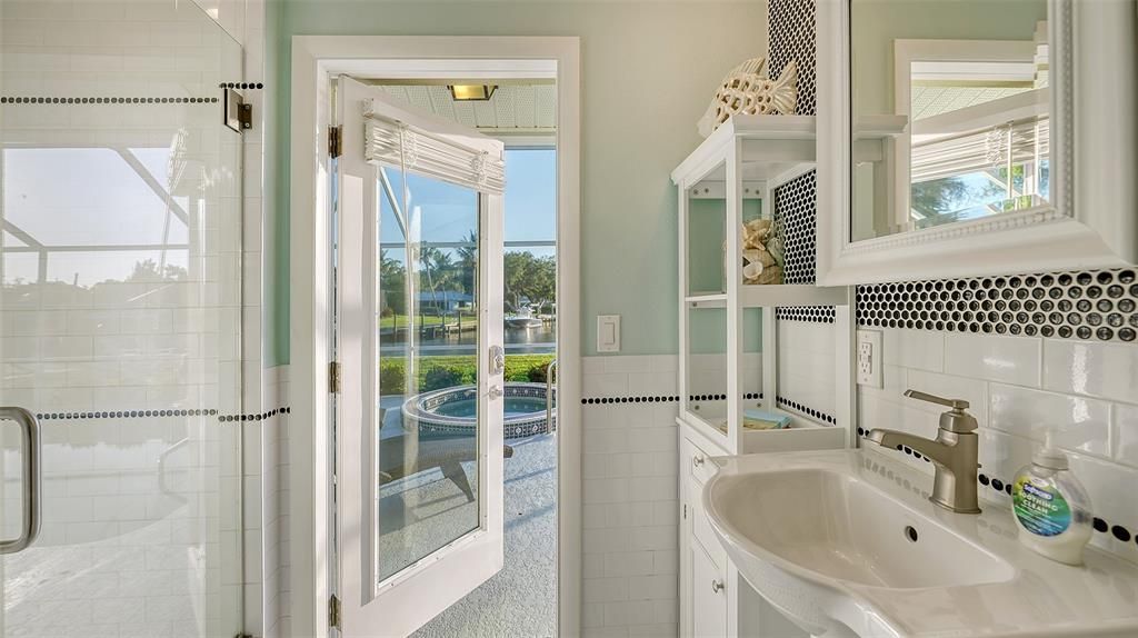 Bathroom 2 is a full bathroom with pool access and could be used as an in-law suite with separate entrance.