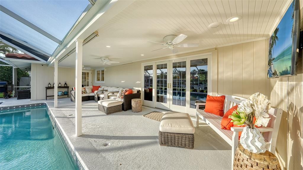 Perfect Florida lifestyle with covered and uncovered outdoor living and dining space.