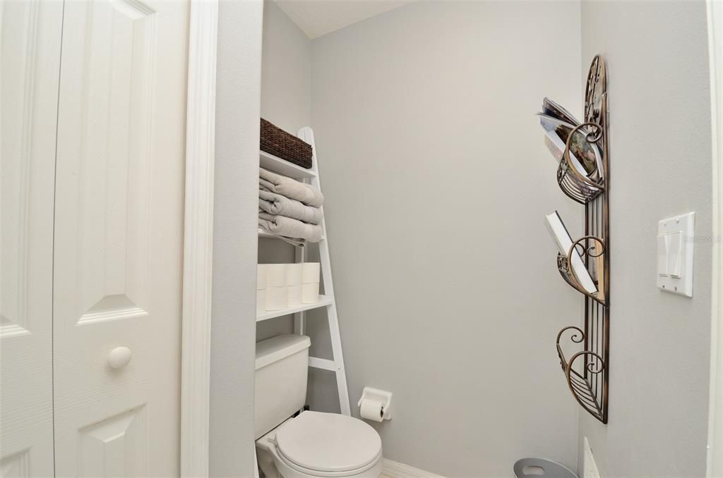 Enclosed water closet in primary bathroom.