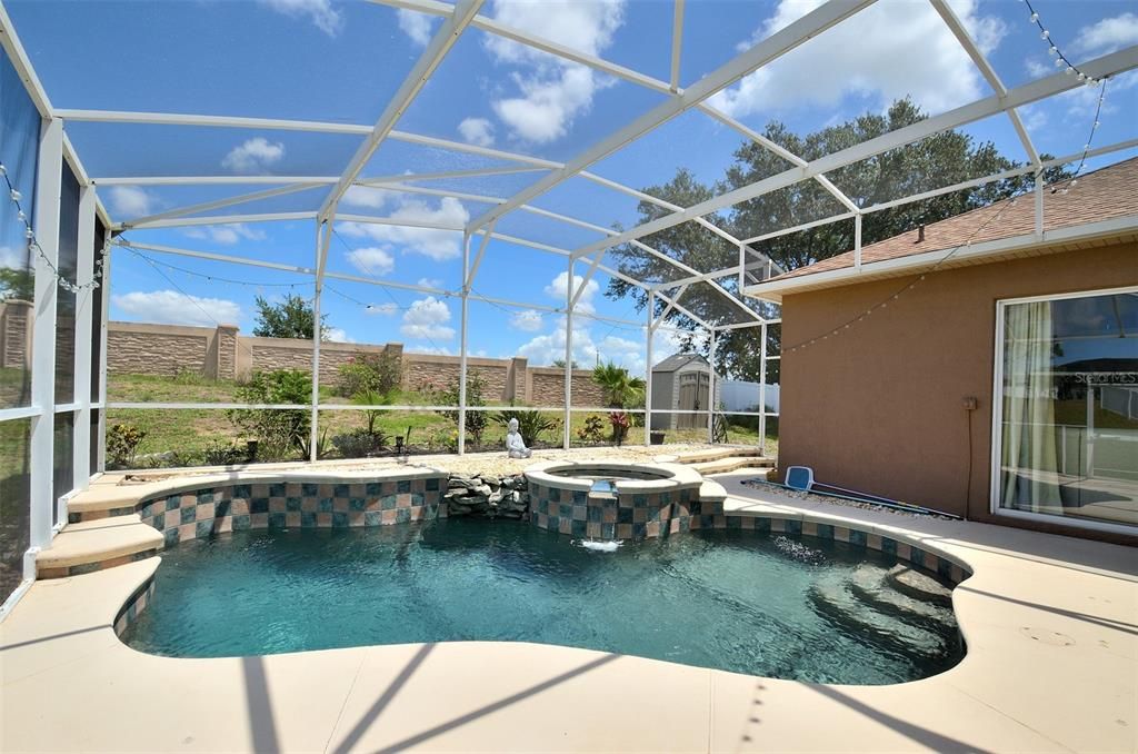 Screened pool and spa.