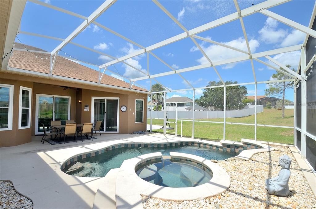 Screened pool and spa.