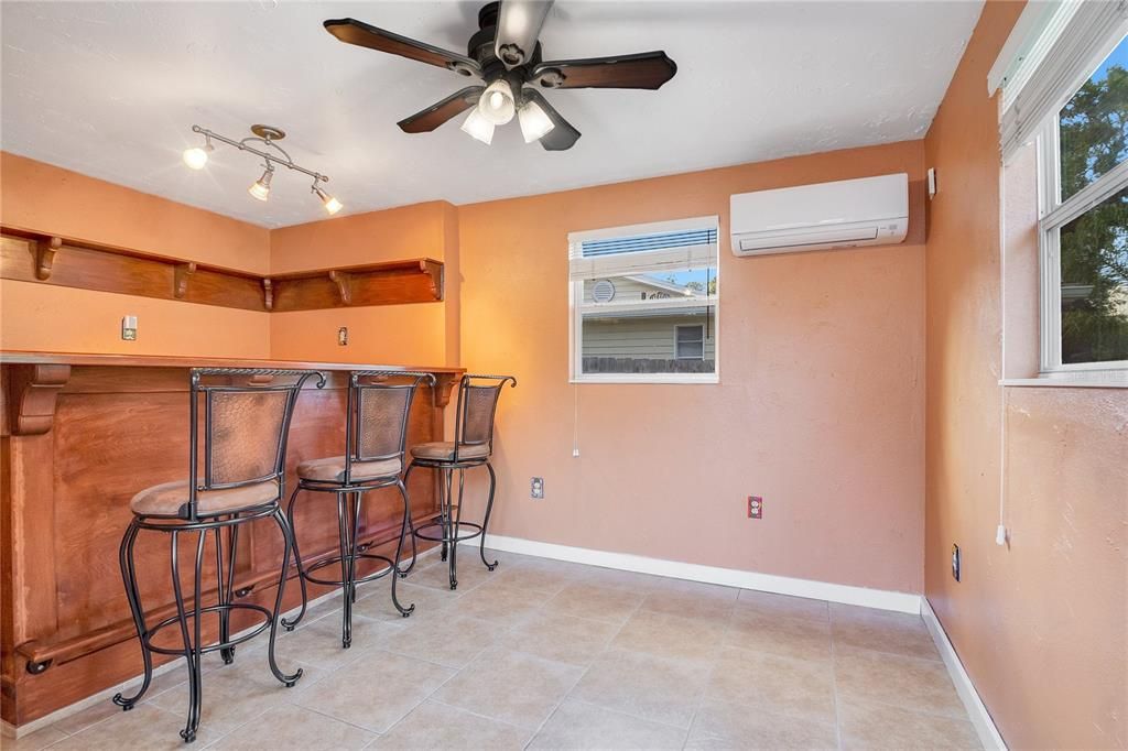 French doors lead out to deck.