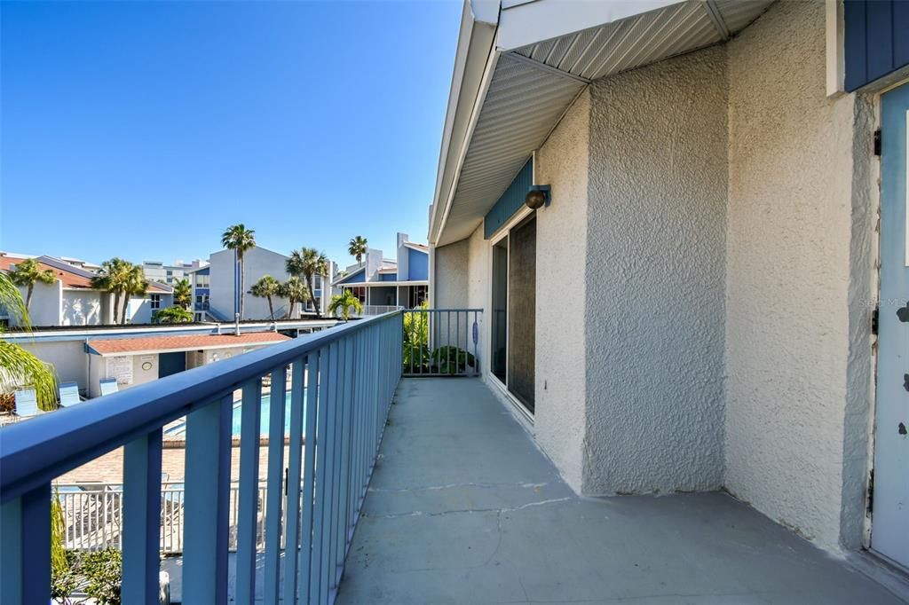 L Shaped Balcony overlooking swimming pool