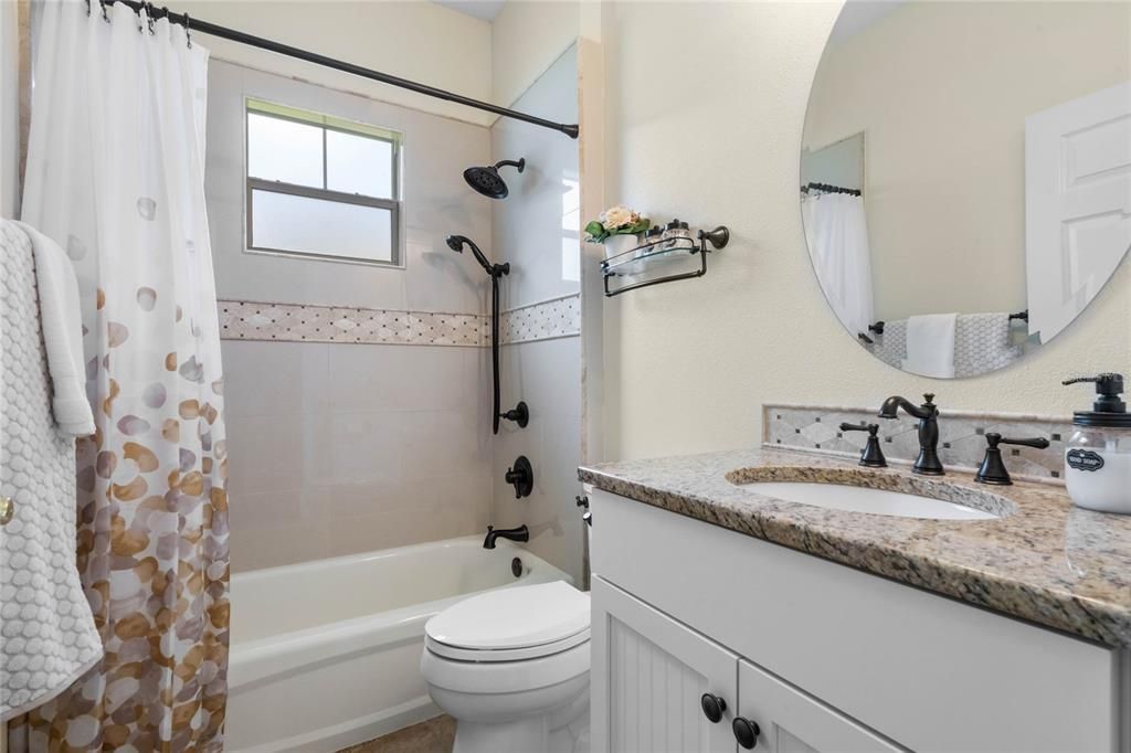 Remodeled Guest Bathroom with Comfort Height Vanity & Toilet