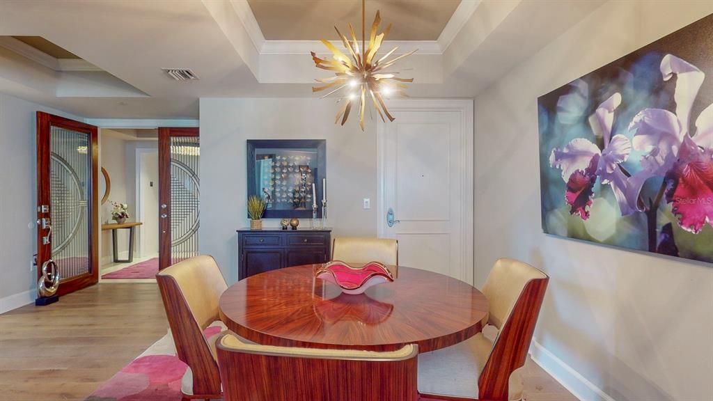 Dining area, can take a much larger table to right door private extra entrance and storage, left side doors to elevators!