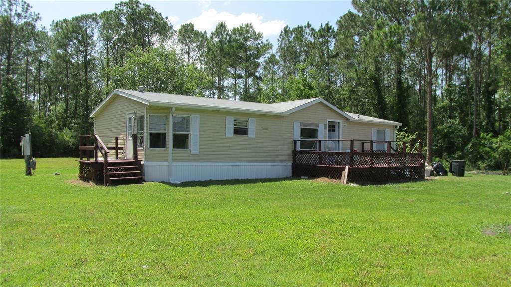 Front Home -- Great Deck.  Side Deck is off of Kitchen