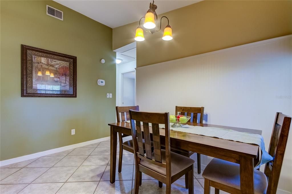 Dining room looking into 2 bedrooms and hall bath