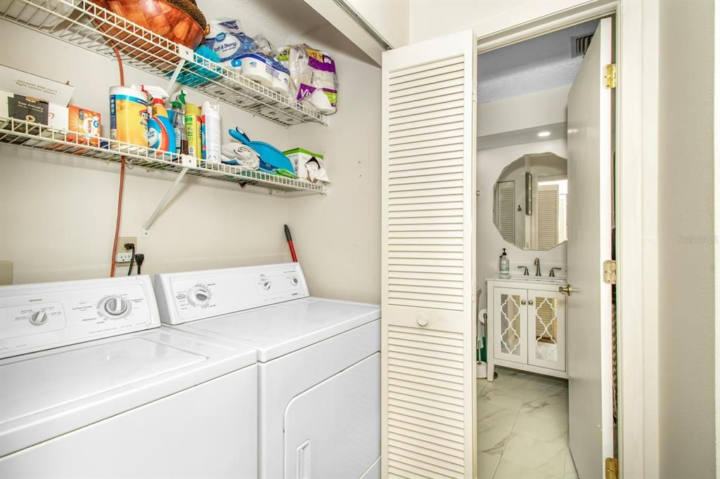 Laundry Closet with full size washer and dryer