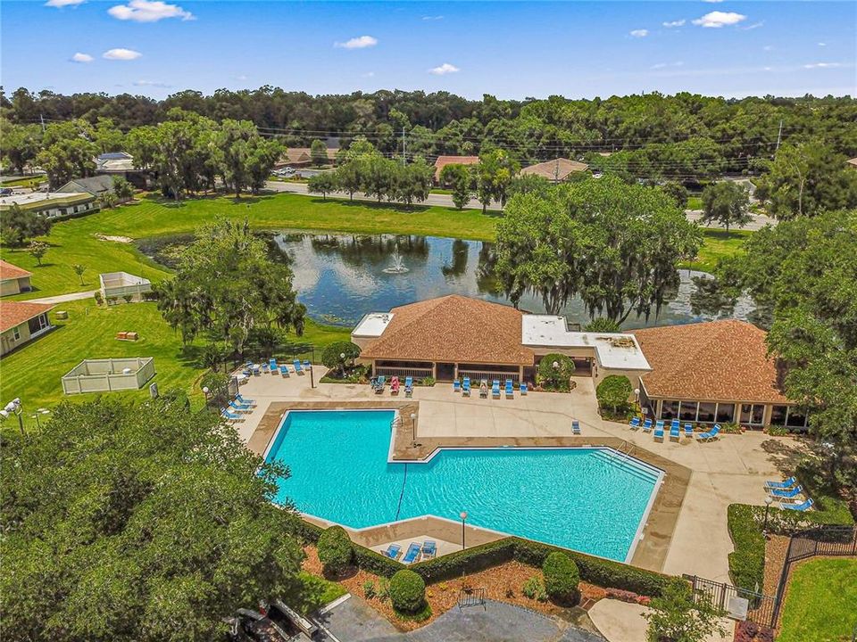 Community pool with loungers