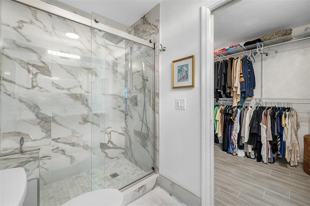 PRIMARY BATHROOM WITH WALK-IN SHOWER AND HUGE CLOSET!