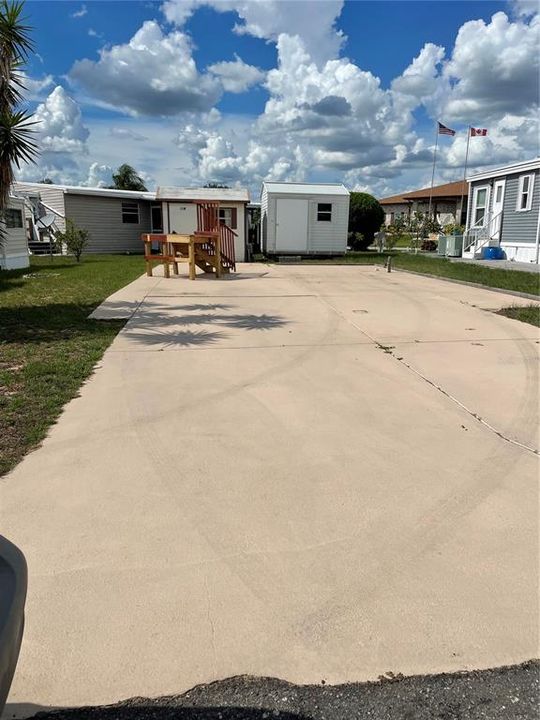 Vacant lot with 2 Sheds & steps