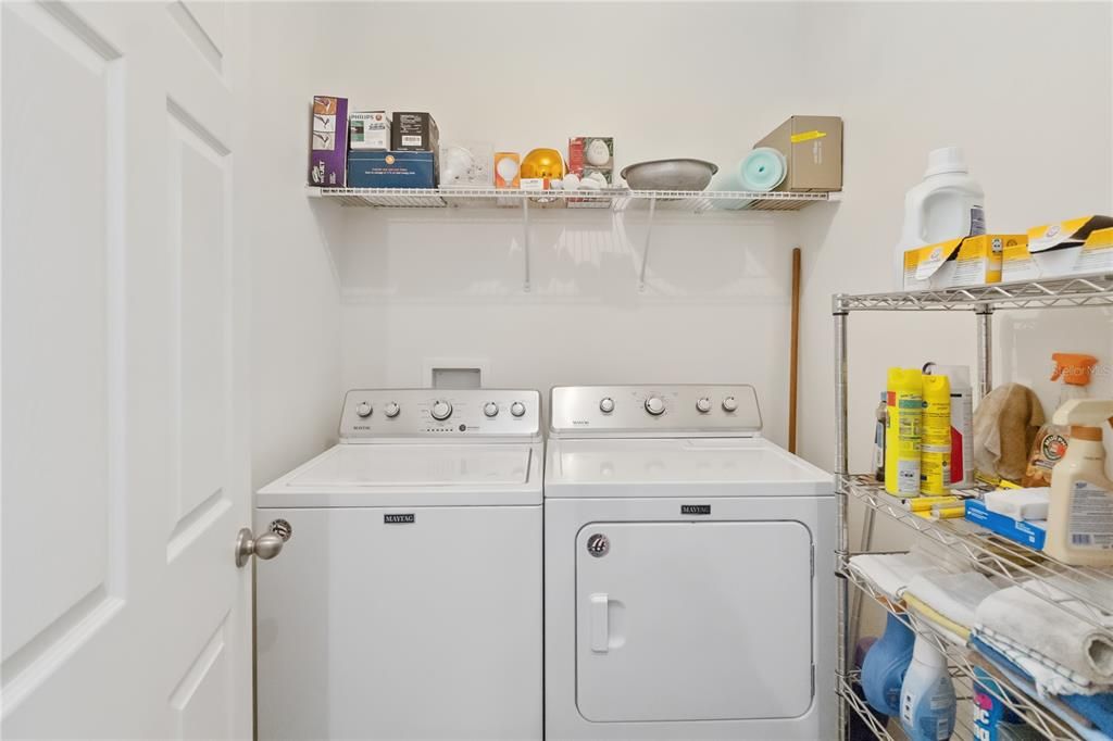 In unit laundry room; washer and dryer stay