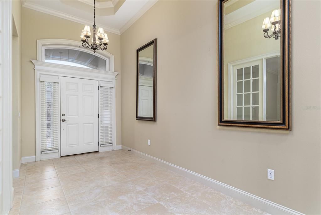 Foyer with hallway to Guest Bedroom and Bathroom