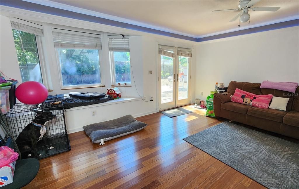 In the rear of the house is the spacious Family Room with access to the large backyard.