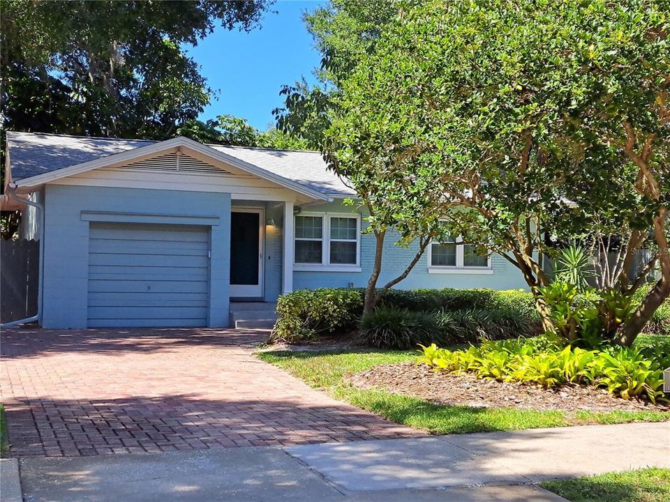 Paver Driveway and sidewalk to entrance and front porch.