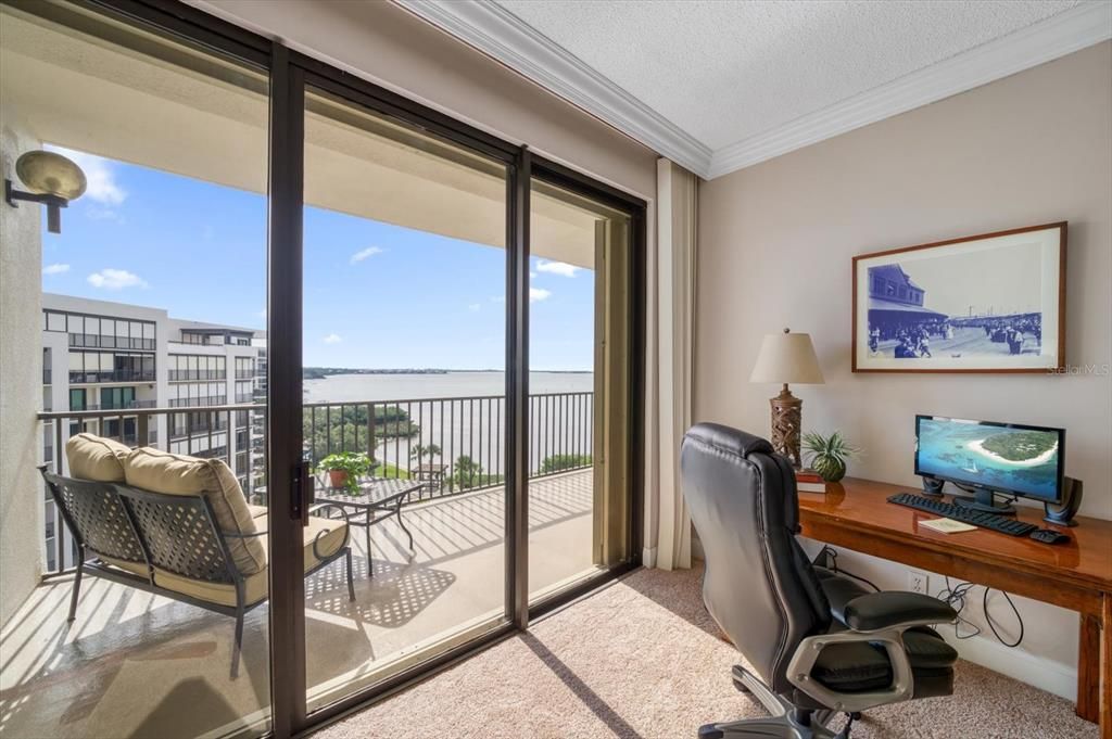 Sitting area in primary bedroom Work from your home office-stress less environment-leads out to private balcony