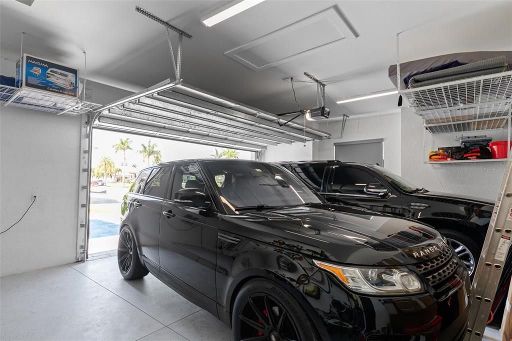 2 1/2 car garage &  Storage racks above