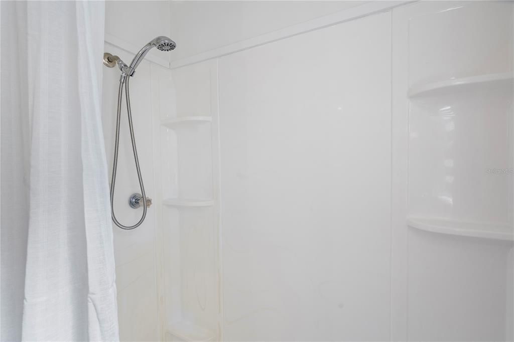 The pristine walk-in shower.