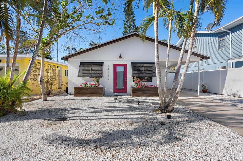 This home, a featured gem on 'For The Love of Old Houses,' is a completely updated, Tropical Oasis just a few steps away from the renowned Madeira Beach.