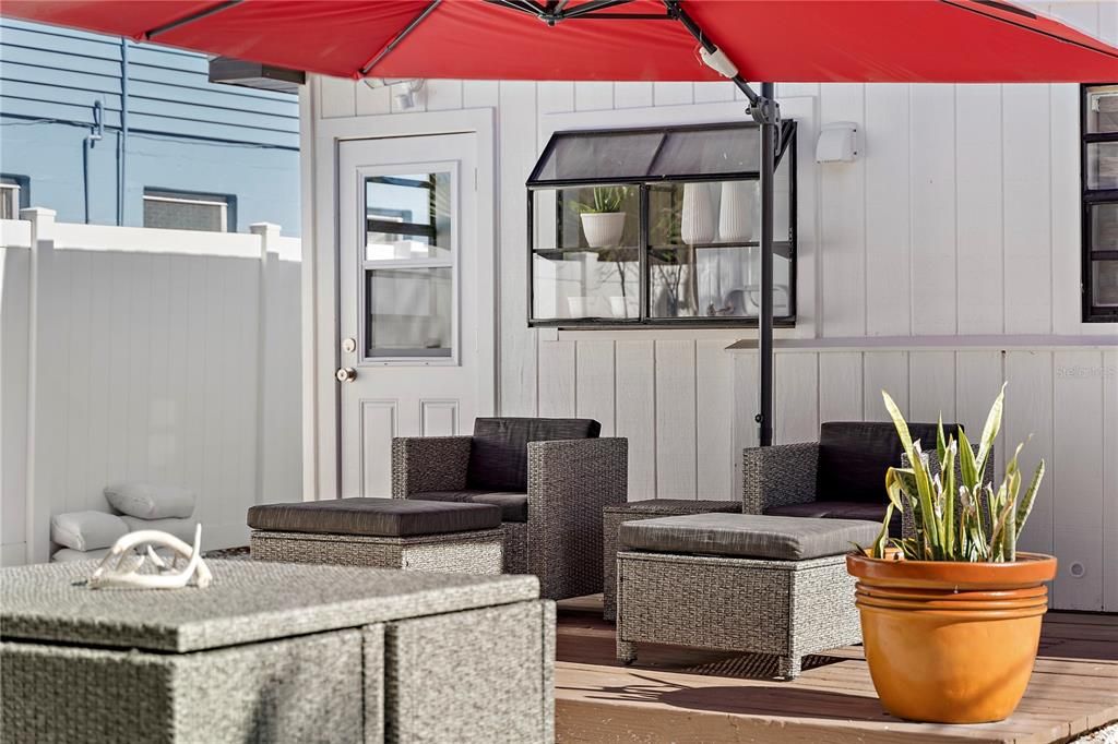 All you need is your favorite beverage! All outdoor furniture and umbrella included!