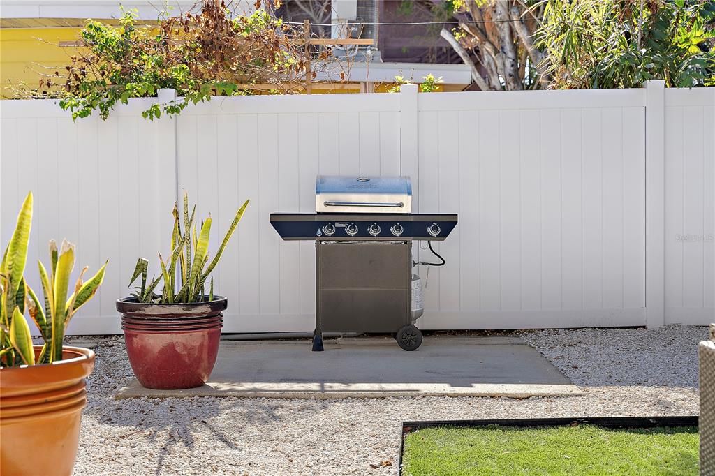 The home comes with a stainless steel outdoor grill.