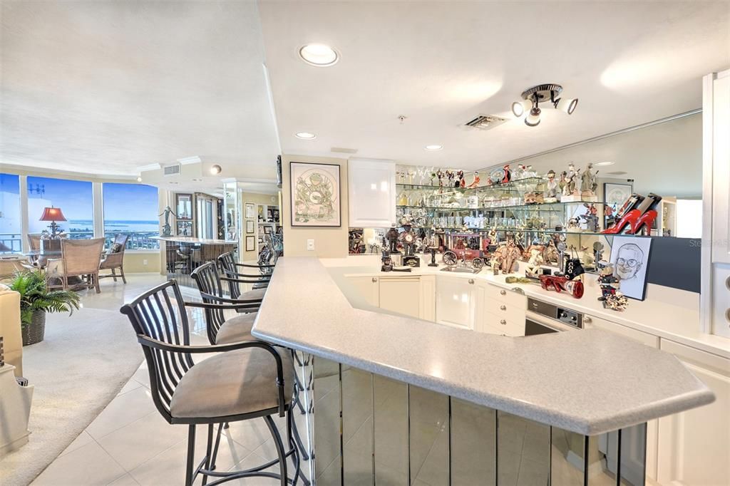 Elevate your hosting game with this long, spacious wet bar designed for those who appreciate the art of entertaining.