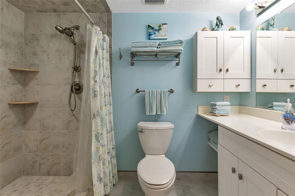 Master bathroom features walk in shower