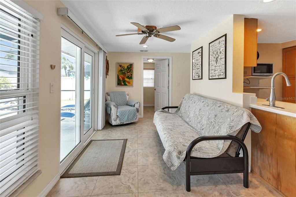 Sitting area flows from dining room.