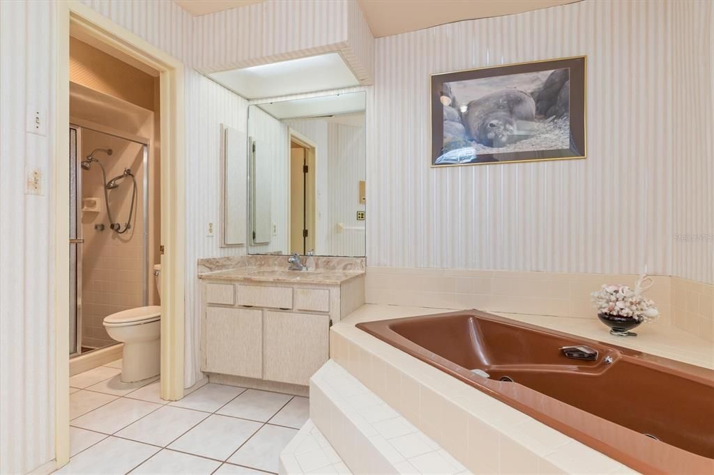 Private water closet and walk-in shower.