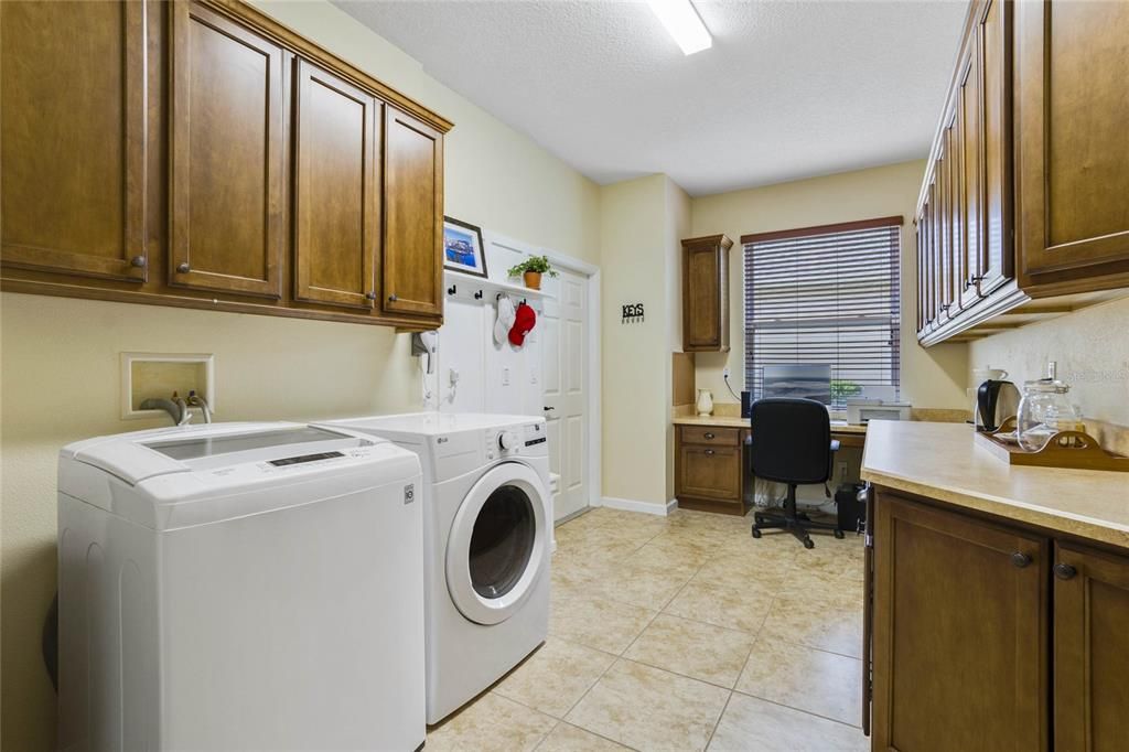 17' x 9' Utility & "smart room" w/ built-in desk, storage cabinets, laundry tub, washer & dryer