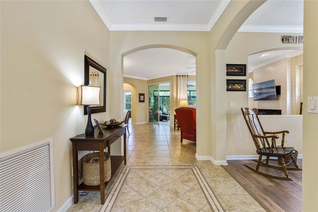 View from Foyer to Great Room area with a Den/Office located to the right