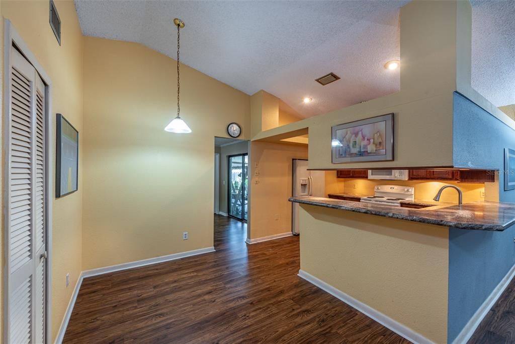 The kitchen has a separate eat-in area and closet pantry for additional storage.