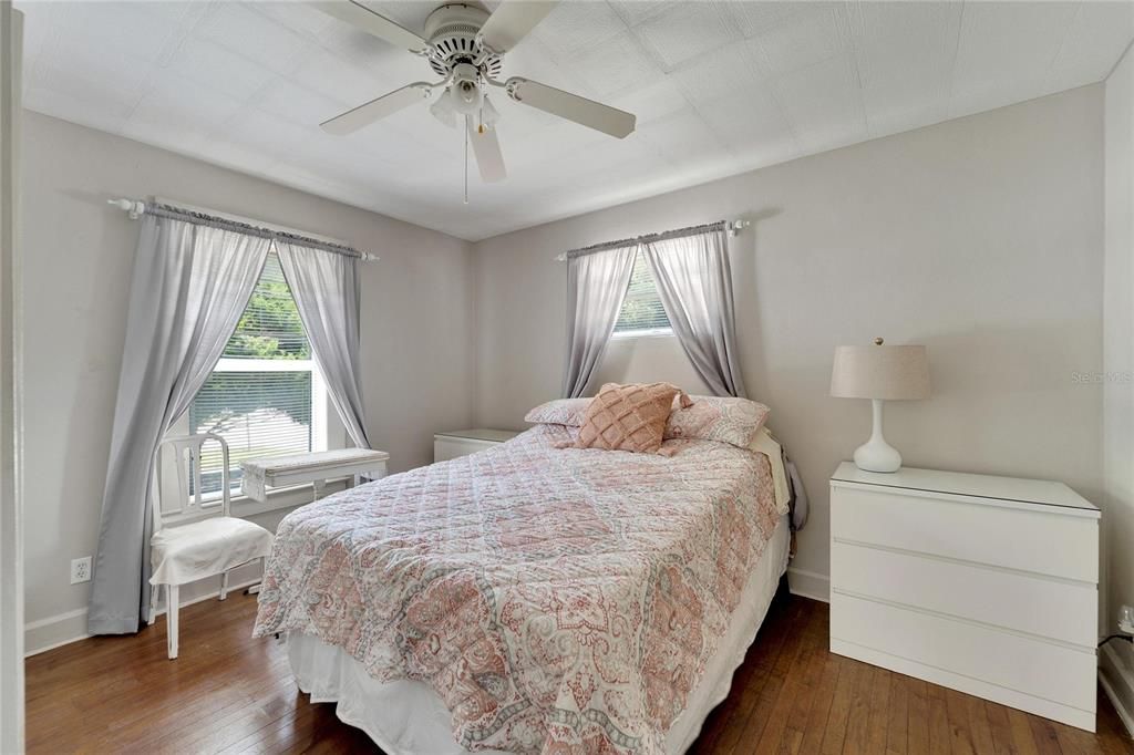 Newer windows , high ceilings and original hardwoods in your primary bedrooms.